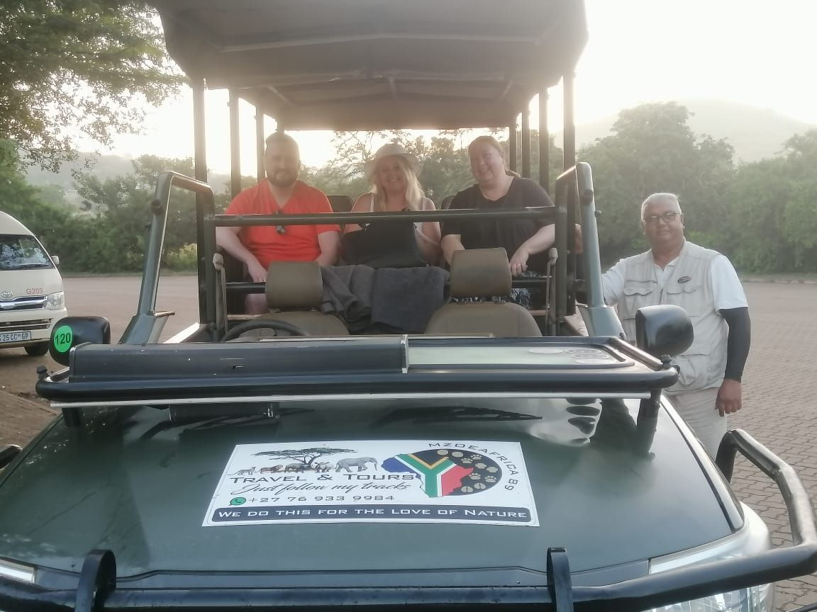 Guests in an open-top safari game viewer