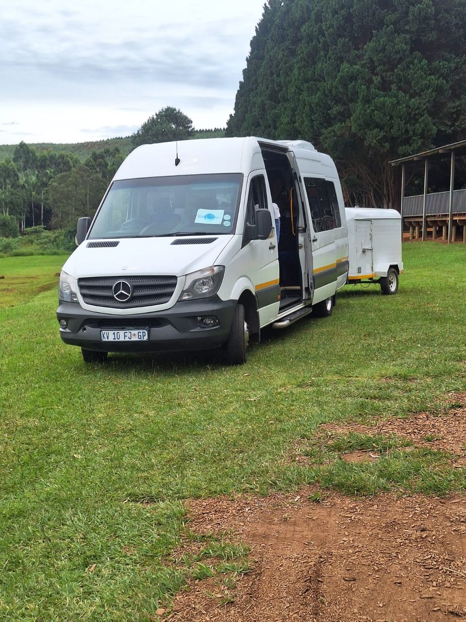 Mercedes-Benz Sprinter and luggage trailer on a Midlands tour stop
